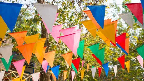 Colorful bunting in outdoor summer festival.