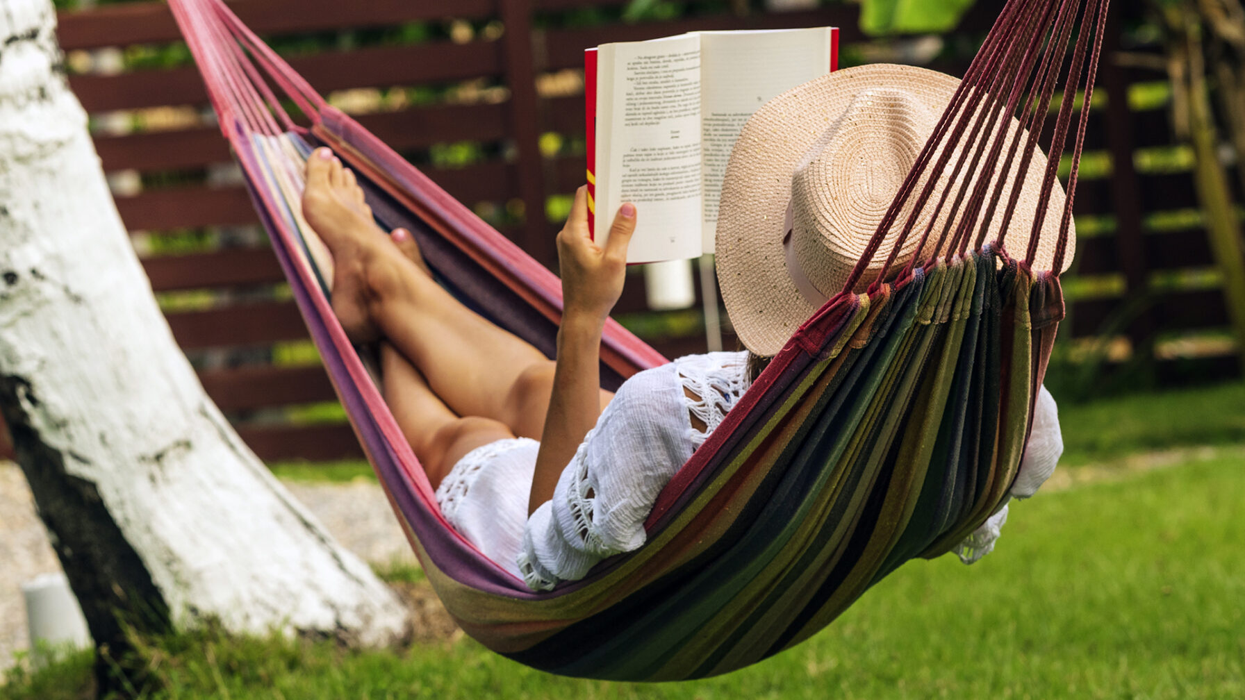 Beautiful woman relaxing in hammock.
